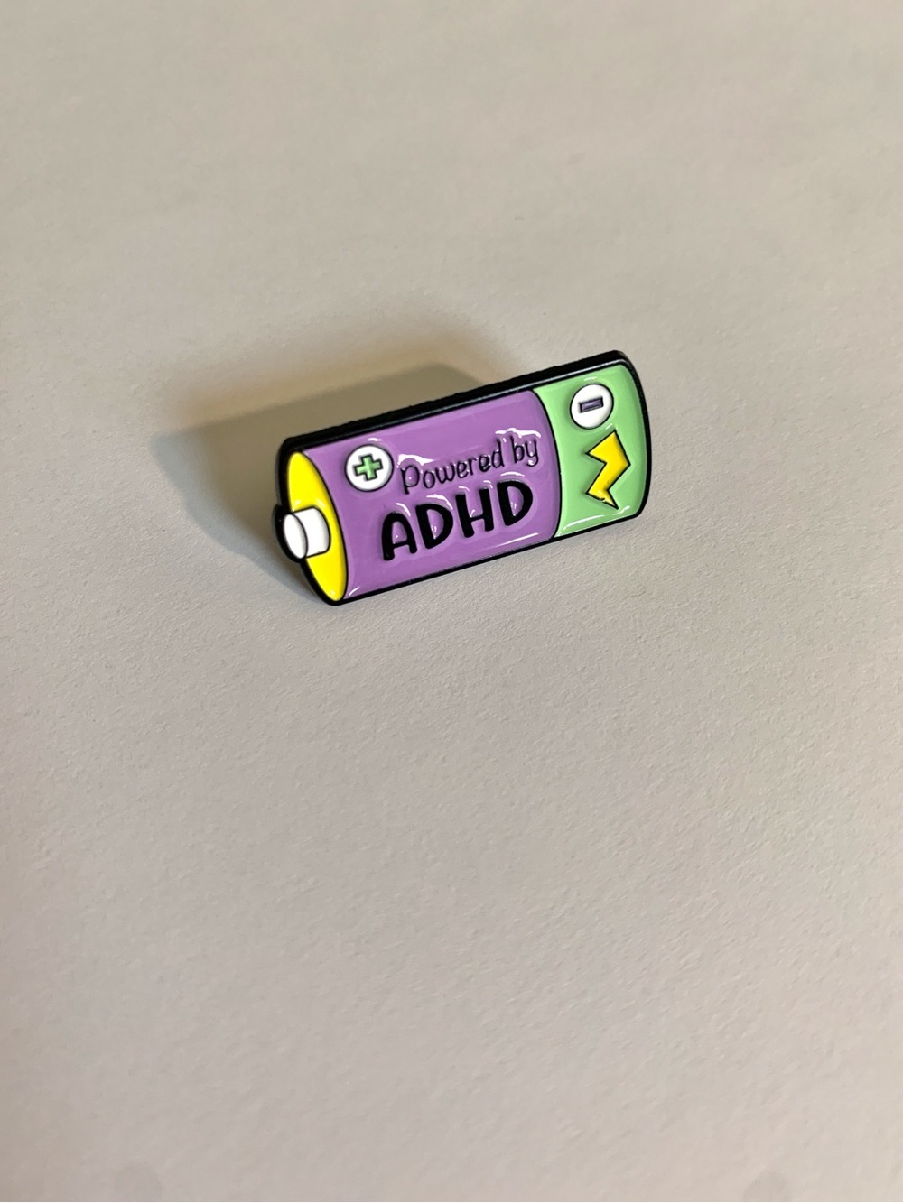 ‘Powered by ADHD' Battery Enamel Pin Brooch - Purple & Green 1 Inch